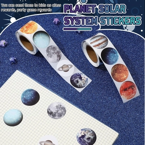 Solar system planet stickers on roll used for decorating notebooks and rewarding kids