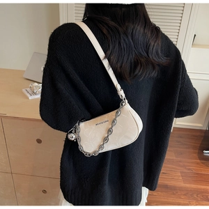 Creamy white chain shoulder bag with crocodile texture and metallic ball charm details