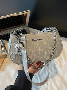 Silver metallic chain shoulder bag with crackle texture and metal balloon dog charm