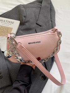 Pink PU leather shoulder bag with chain strap and silver balloon dog charm decoration