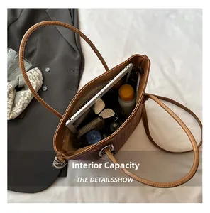 Detailed view of the brown woven tote bag interior showing its large storage capacity