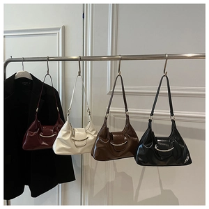Hobo bags in burgundy, off-white, coffee, and black with silver metallic accents