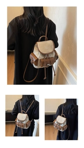 Detail of vintage canvas backpack with multiple leather pockets and high-capacity structure