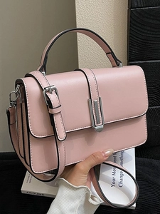 Pink PU leather crossbody bag with silver buckle and elegant top handle for women