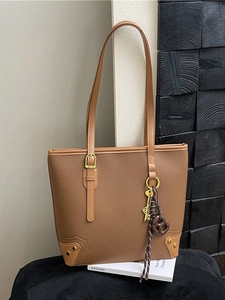 Brown faux leather tote bag with lychee texture and gold hardware for daily commuting