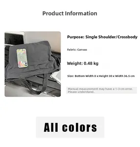 Detailed size specifications and 0.48kg weight for the grey canvas tote shoulder bag