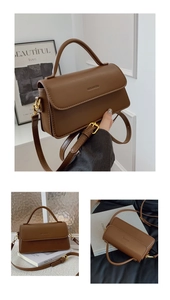 Gros plan d'un sac à main vintage marron avec détails dorés et rabat magnétique
