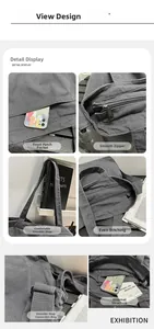 Detailed close-up of dark grey canvas tote bag with front pocket and durable stitching