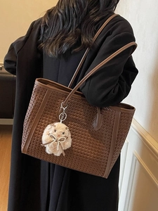 Large dark brown woven tote bag for women with cute plush bear pendant accessory