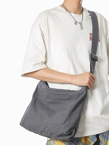 Minimalist dark grey canvas messenger bag with adjustable strap for women