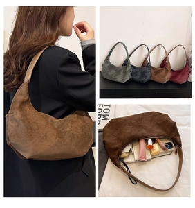 Detailed interior view of multi-color suede hobo bag showing large storage capacity