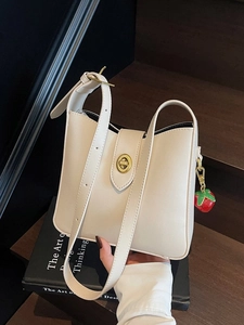 Elegant Women PU Leather Bucket Bag Minimalist Shoulder Crossbody Bag With Twist Lock And Strawberry Charm Daily Office Commuter Bag