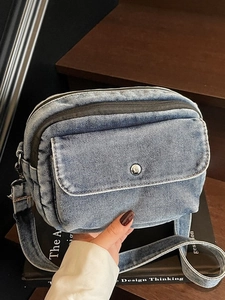Vintage blue denim crossbody bag with multi-compartments and adjustable strap for women