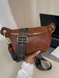 Brown retro PU leather half-moon crossbody bag with wide geometric printed strap