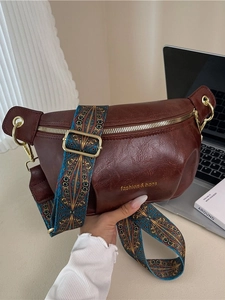 Retro dark brown pebbled leather crossbody dumpling bag with colorful woven strap