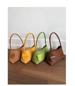 Selection of matte finish shoulder bags in tan, yellow, green, and dark coffee colors