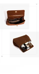 Vue détaillée de l'intérieur spacieux d'un sac en daim marron avec accessoires quotidiens