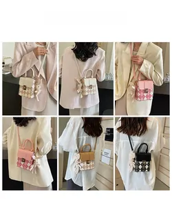 Quilted mini crossbody bag with metal twist lock shown in four colors with rabbit charm