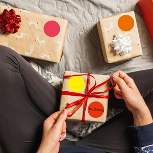 Colorful round gift label stickers with hand-written font on matte finish surface