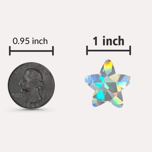 Detailed size comparison of a 1-inch holographic laser star sticker with a quarter coin