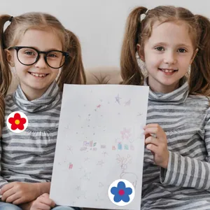 Close-up of kids wearing striped shirts and round glasses holding colorful flower stickers