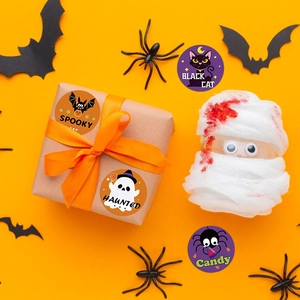 Halloween decorative round stickers with spooky cartoon patterns on gift boxes