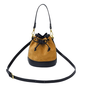 Sac seau vintage gingembre givré avec matelassage en losange et fermeture à cordon