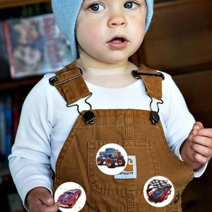 Detail of adhesive car vehicle stickers for decorating children's corduroy overalls