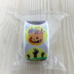 Detail of Halloween Trick or Treat roll stickers showing pumpkin and zombie hand designs