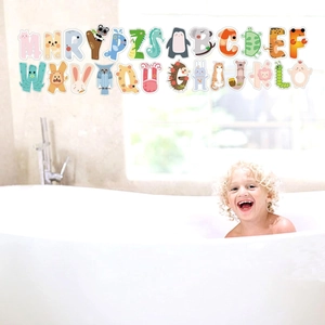 26 Cartoon animal alphabet bath stickers for toddlers in a bright bathroom setting