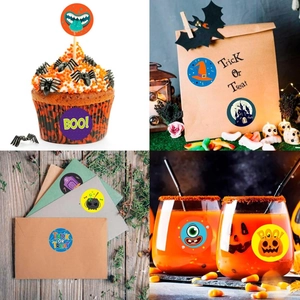 Detail of Halloween stickers on cupcakes and gift bags with pumpkins and witch hats