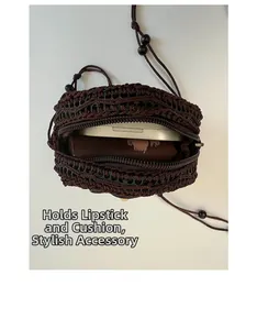 Detail view of mini hand-woven bag interior showing lipstick and cushion storage