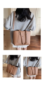 Detail der braunen Ledertasche mit Litschi-Muster, Druckknopftasche und Schultergurt