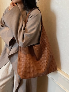 Brown woven tote bag with smooth leather shoulder strap, stylish large hobo bag for women