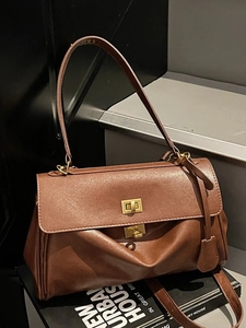 Retro brown leather tote bag with gold metal clasp and soft handle for women