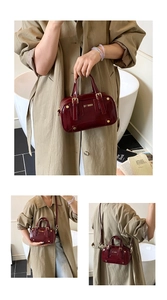 Deep red patent leather Boston bag shown in hand-carry, shoulder, and crossbody styles
