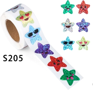 Detail of holographic star stickers with cute emoji expressions for reward charts