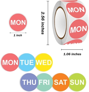 Macro detail of 1-inch colorful weekday roll stickers with English abbreviations