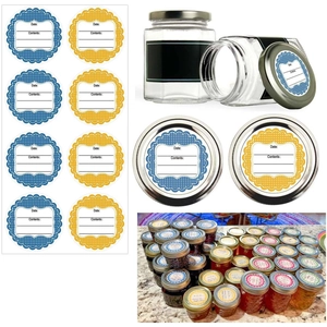 Macro detail of blue and yellow self-adhesive food labels on glass kitchen storage jars