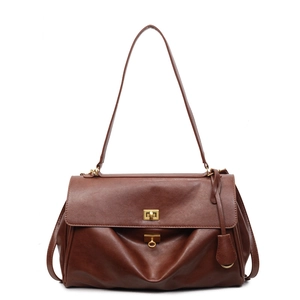 Classic dark brown tote bag with premium leather texture and golden metal twist-lock