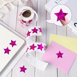Holographic star stickers roll in rose pink for reward charts and gift decoration