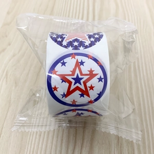Close-up of star pattern adhesive labels with US flag colors in a 3.8cm roll package