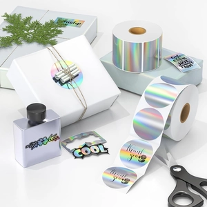 Roll of holographic laser thermal labels with rainbow gloss and decorative texts