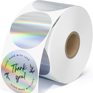 Roll of holographic round thank you stickers with handmade labels and rainbow laser finish