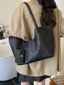 Retro black woven leather tote bag with matching pouch and minimalist shoulder straps