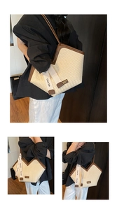 Detail view of woven tote bag with brown leather trim and decorative branded webbing
