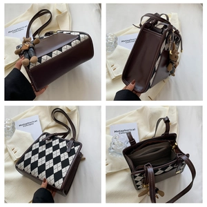 Detail view of vintage patchwork tote with deep brown leather and houndstooth pattern