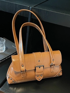 Retro camel faux leather shoulder bag with silver rivet details and a buckle closure