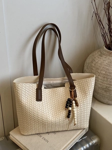 Vintage large woven tote bag in cream white with brown leather handles and bead charm