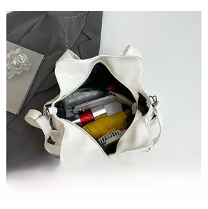 Top view of cream white star-shaped tote bag showing spacious interior with daily items